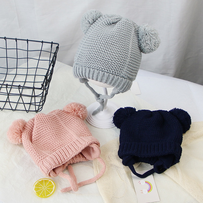 Mũ dệt kim mềm mại thiết kế hình tai thỏ phối quả bóng lông xù ấm áp màu trơn thiết kế dễ thương cho bé