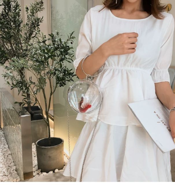 Túi clutch hình cầu lông vũ đi tiệc trong suốt cực sang