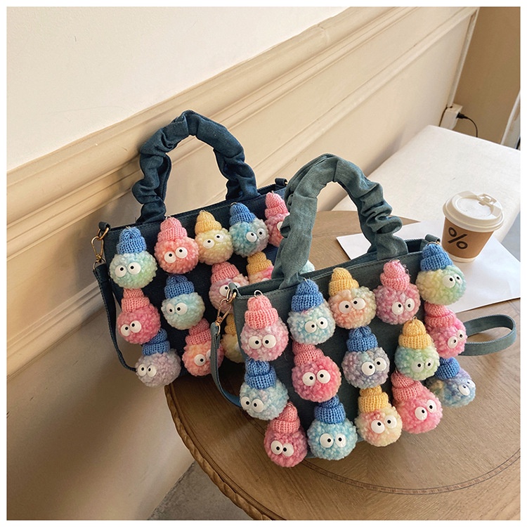 Túi xách gắn búp bê nhồi bông đáng yêu cho nữ