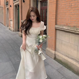 Đầm midi nude xếp ly nhún ngực tay phồng