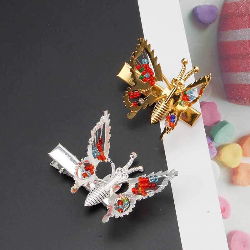 Kẹp tóc thiết kế đính bướm khoét rỗng xinh xắn cho bé gái
