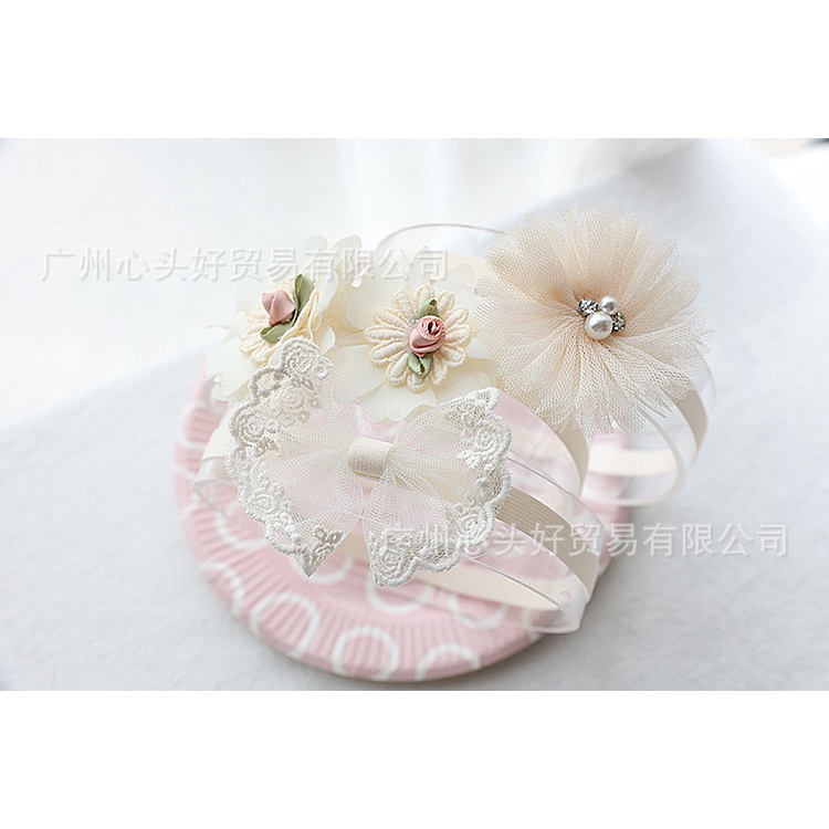 Băng đô hoa, nơ màu kem cho bé gái đáng yêu