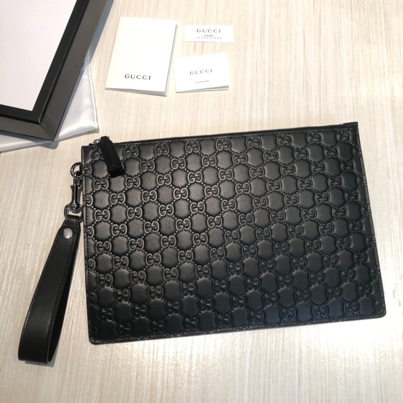 Cluth cầm tay cho nam Gucci GC da thật cao cấp bản dẹt dập chìm logo thương hiệu