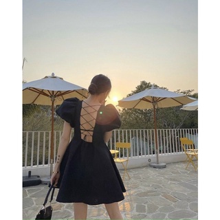 Đầm bbd đen tay phồng đan lưng