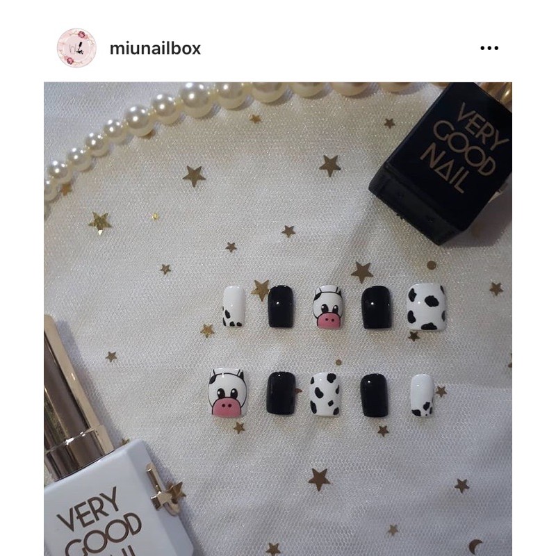 Móng giả thiết kế bò sữa