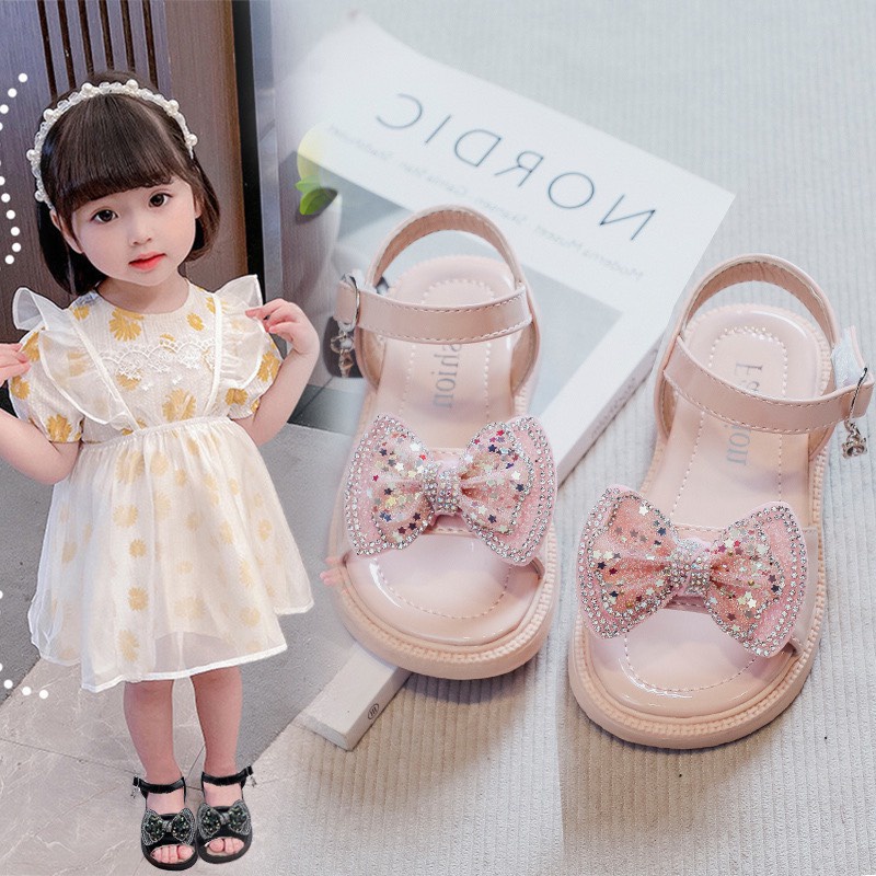 Sandal đính nơ kèm vương miện cho bé gái mẫu hot 2022 - Hàng Quảng Châu Cao Cấp (K62)