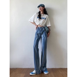 Quần jean ống rộng vệt loang màu ơi