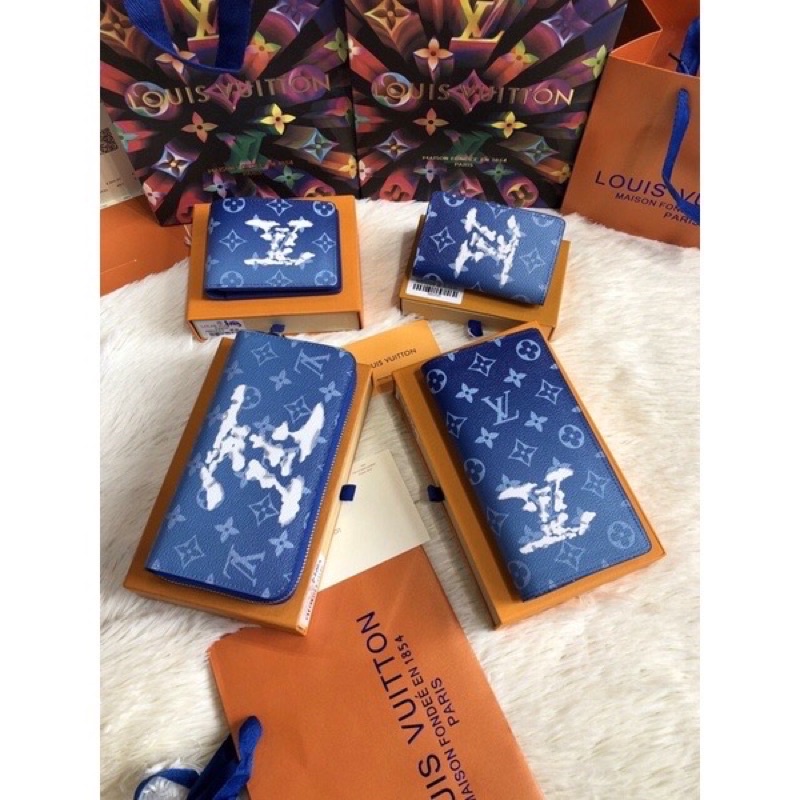 Ví da lv nam cao cấp, ví dài cầm tay nam nữ hàng bảo hành 1 năm.