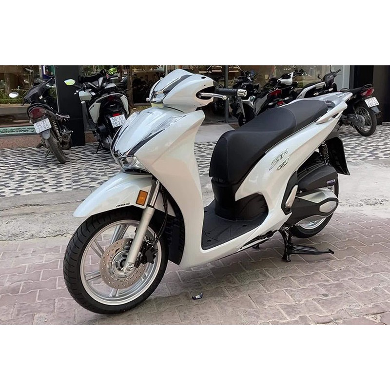 Nắp hộp đồ trước nắp cốp phụ phải sh 350 honda