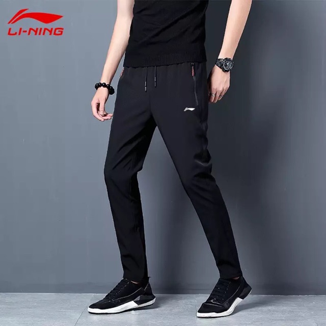 Quần gió lining nam