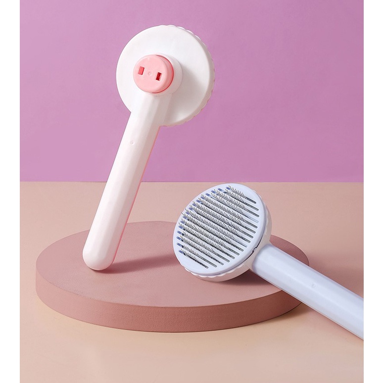 lược tròn chải lông rụng có nút bấm cho thỏ, chó, mèo