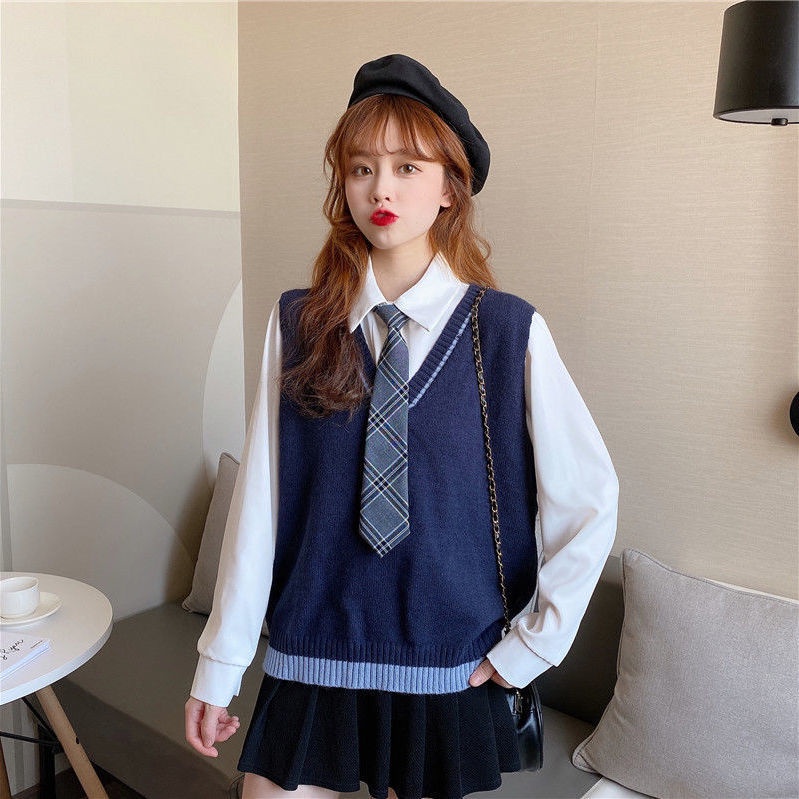 Áo khoác không tay phối họa tiết caro sành điệu