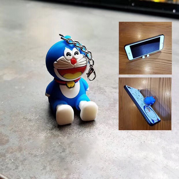 Ốp lưng  iPhone hình Doraemon có dây móc tay cho 6 6S 7 8 Plus X