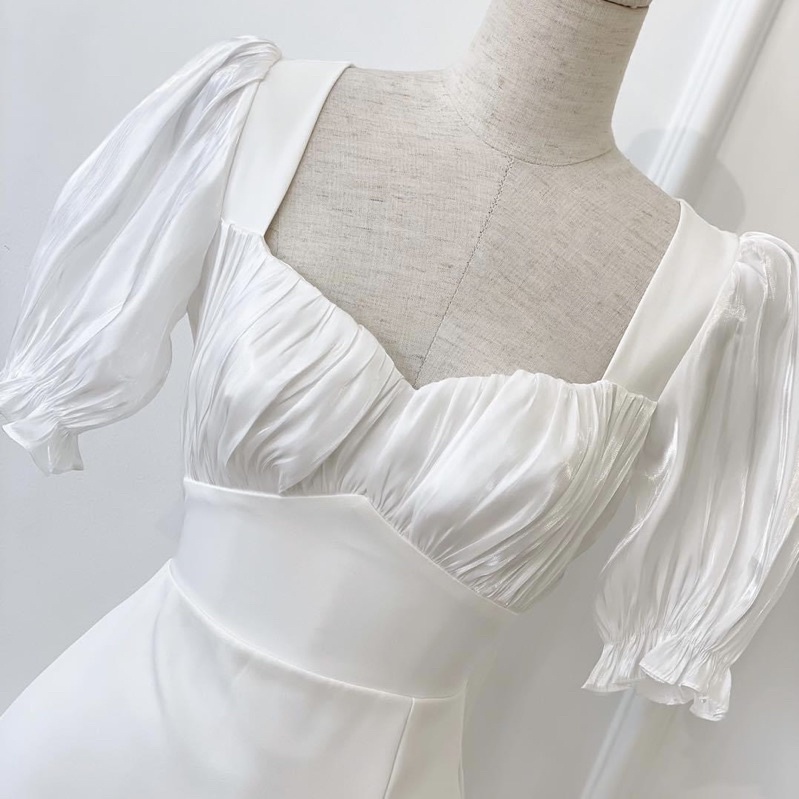 Đầm midi trắng xẻ tà tôn dáng