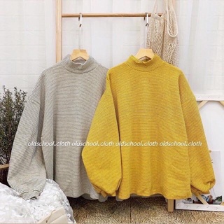 Áo nỉ kẻ cổ lọ tay bom