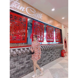 Váy nhúm hoa cam dài tay