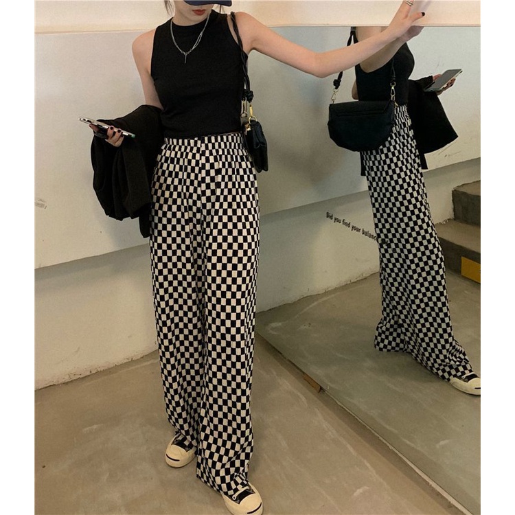 Quần dài ống rộng họa tiết sọc caro trắng đen dễ phối đồ thời trang cá tính cho nữ