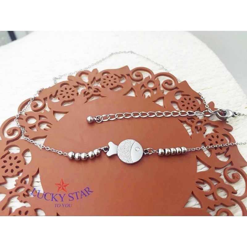 Lắc chân cá vàng TiTan trắng vĩnh viễn không đen