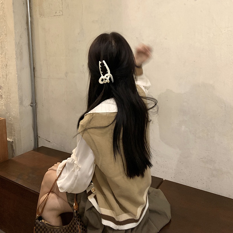 Áo khoác len không tay cổ chữ V màu sắc tương phản thời trang | BigBuy360 - bigbuy360.vn