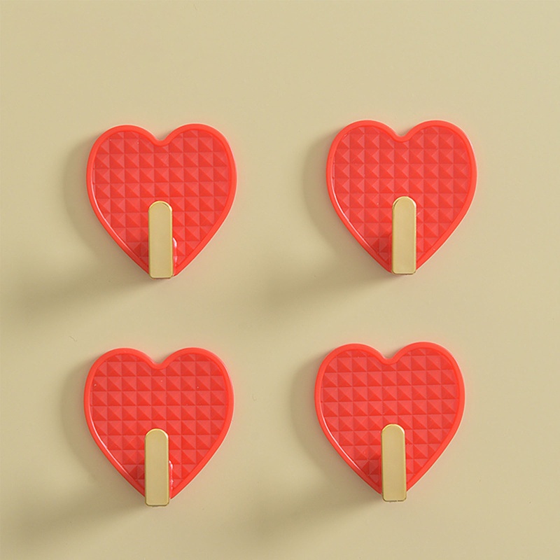 Set 4 Móc Treo Đồ Hình Trái Tim Bằng Nhựa Tiện Dụng Cho Phòng Khách / Phòng Ngủ