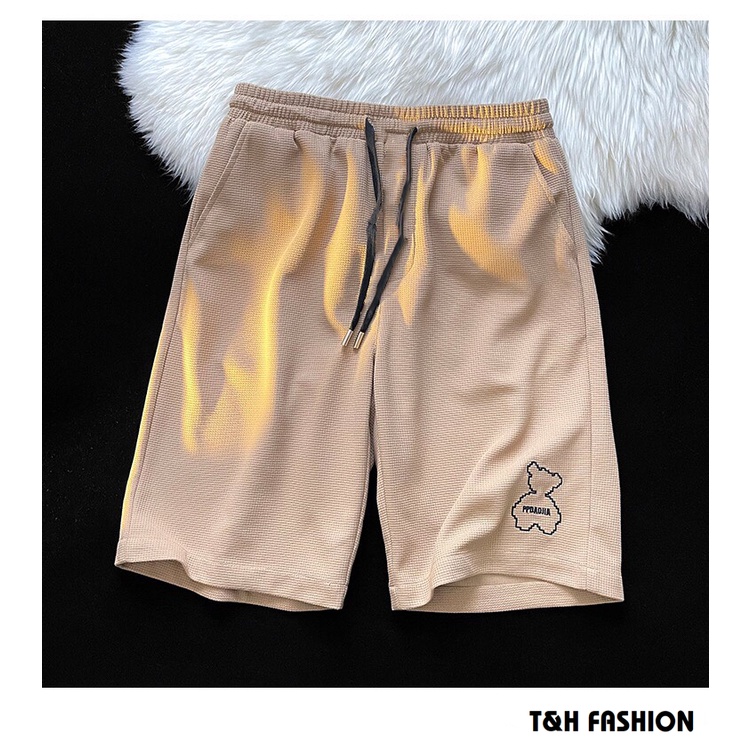 Quần đùi nam nữ vải tổ ong cao cấp - Quần short Unisex thêu hình gấu trúc cực đáng yêu.