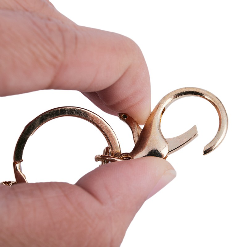 Móc khóa có hình gà trống đính đá COD