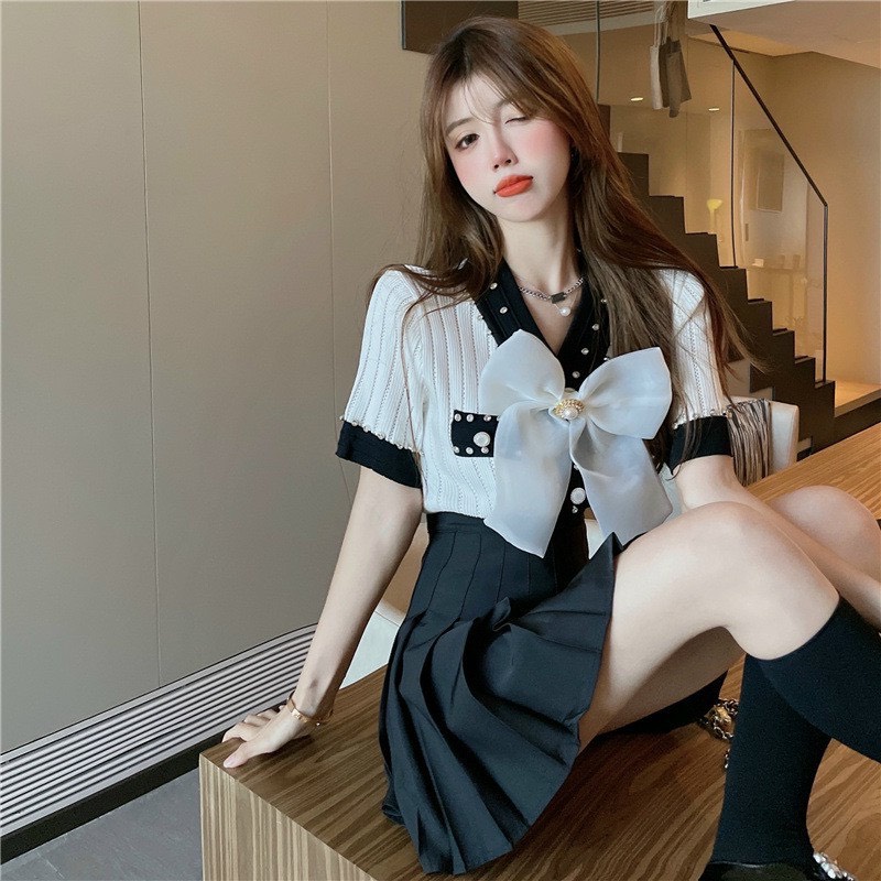 Áo len cổ đính nơ tiểu thư