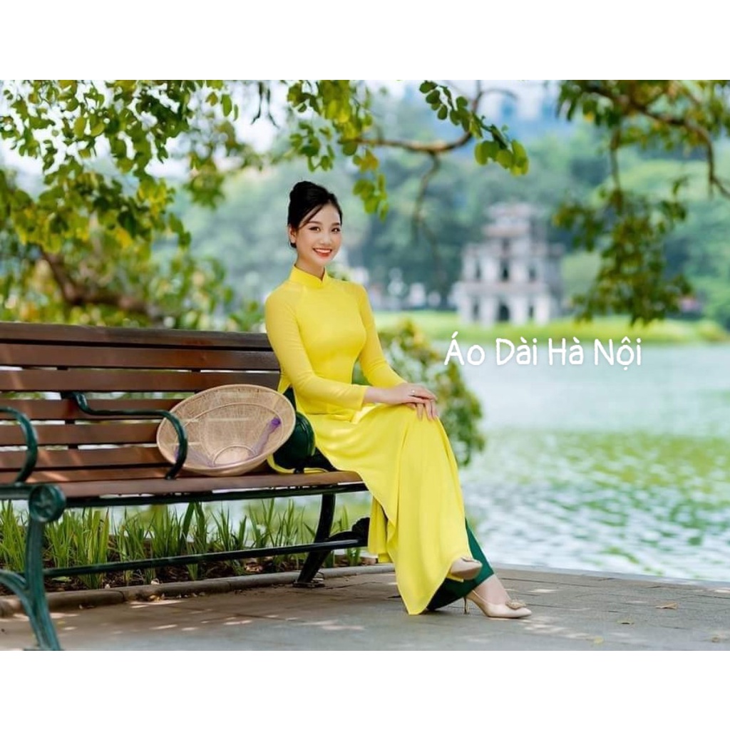 Áo dài trơn 4 tà màu vàng cuốn hút - Áo Dài Hà Nội