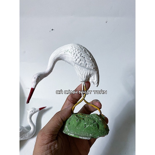 1 CON CÒ ĐẤT NUNG TRANG TRÍ HỒ CÁ NON BỘ CAO KHOẢNG 19CM