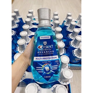 1 Chai Nước Súc Miệng Crest PRO Health Multi Protection Clean Mint 1 lit của Mỹ ( Màu Xanh )