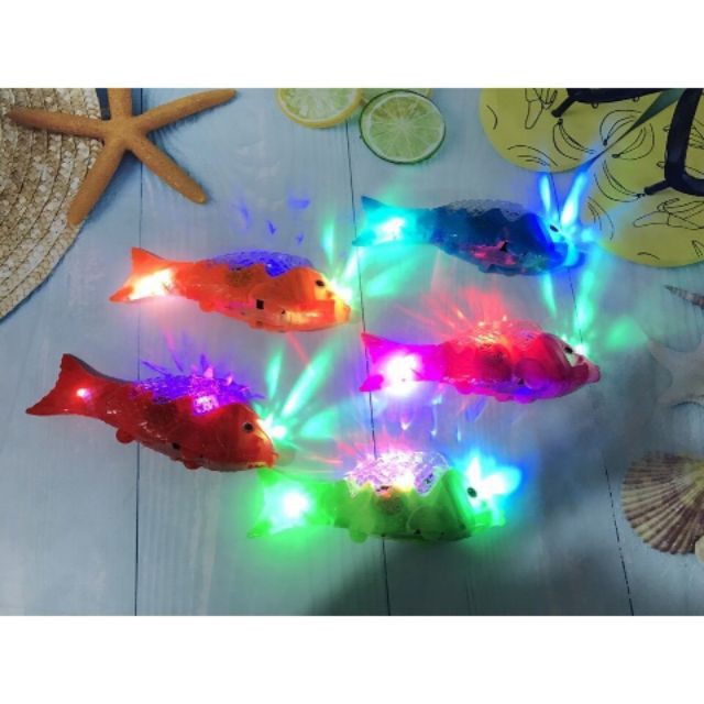 Đồ Chơi Cho Bé - Đèn Cá Phát Nhạc Có Đèn Led Có Bánh Xe( Cá Quẫy Đuôi )