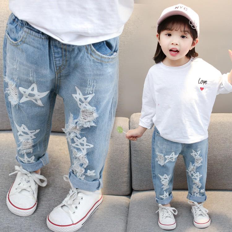 Quần jean dài hình ngôi sao cho bé gái