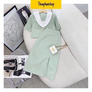 Set áo vest tay ngắn croptop + chân váy midi xanh xẻ