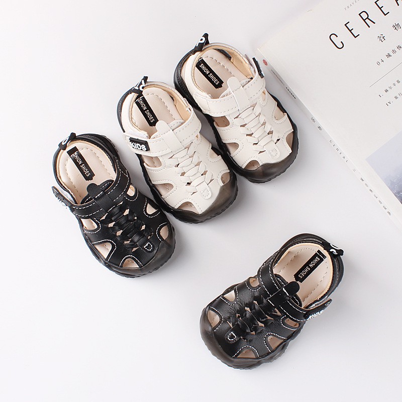 Sandal tập đi cho bé, Dép rọ bé trai bé gái quai dán KIDS chất da PU thoáng khí có chống vấp cho bé từ 0-2 tuổi M8810