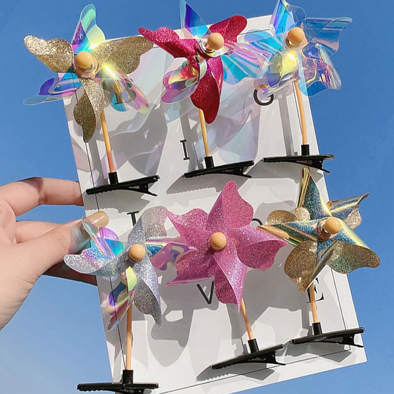 Kẹp tóc bé gái thiết kế chong chóng dễ thương có thể xoay vòng