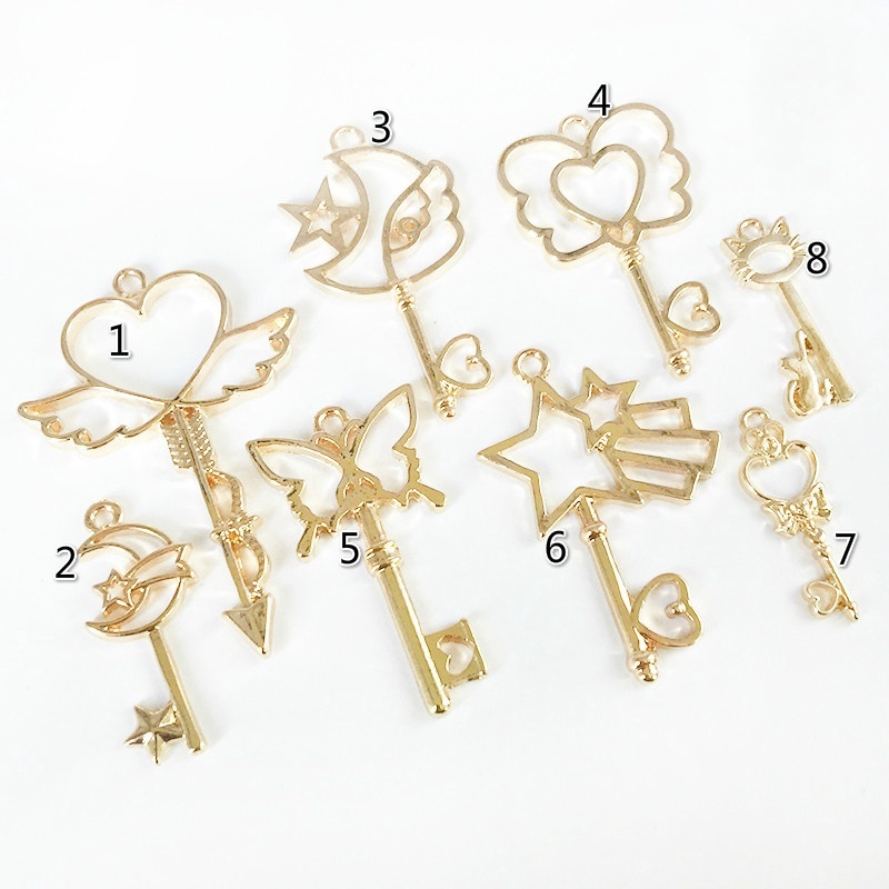 Set 2 Móc Khóa Khung Kim Loại Hình Chìa Khóa/Mặt Trăng/Ngôi Sao Độc Đáo