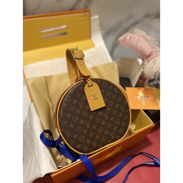 Túi quai xách tròn khoá bấm