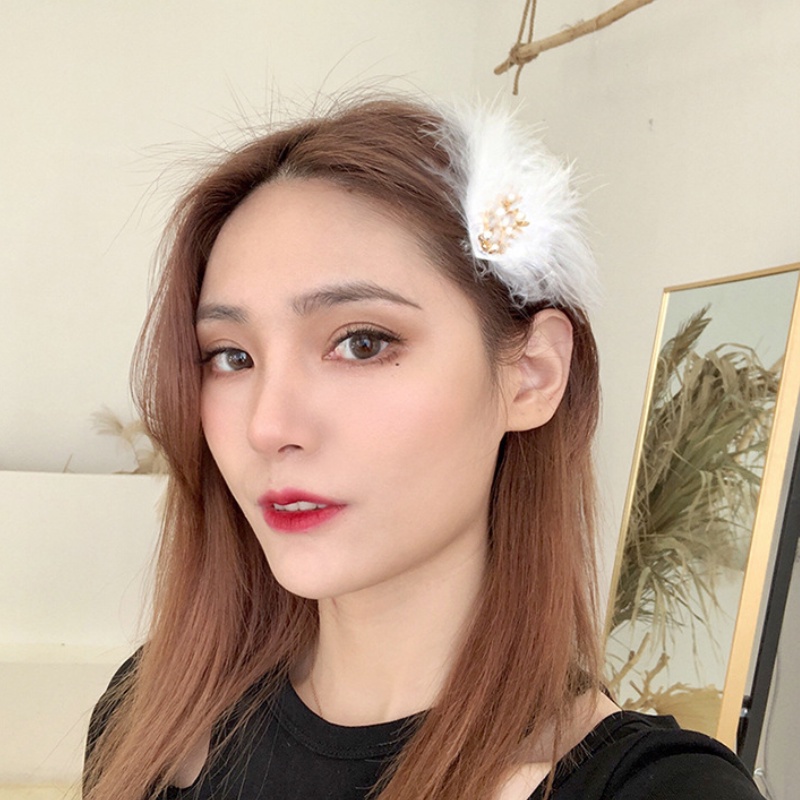 Kẹp tóc hình lông vũ phong cách Hàn Quốc thời trang đơn giản cho nữ