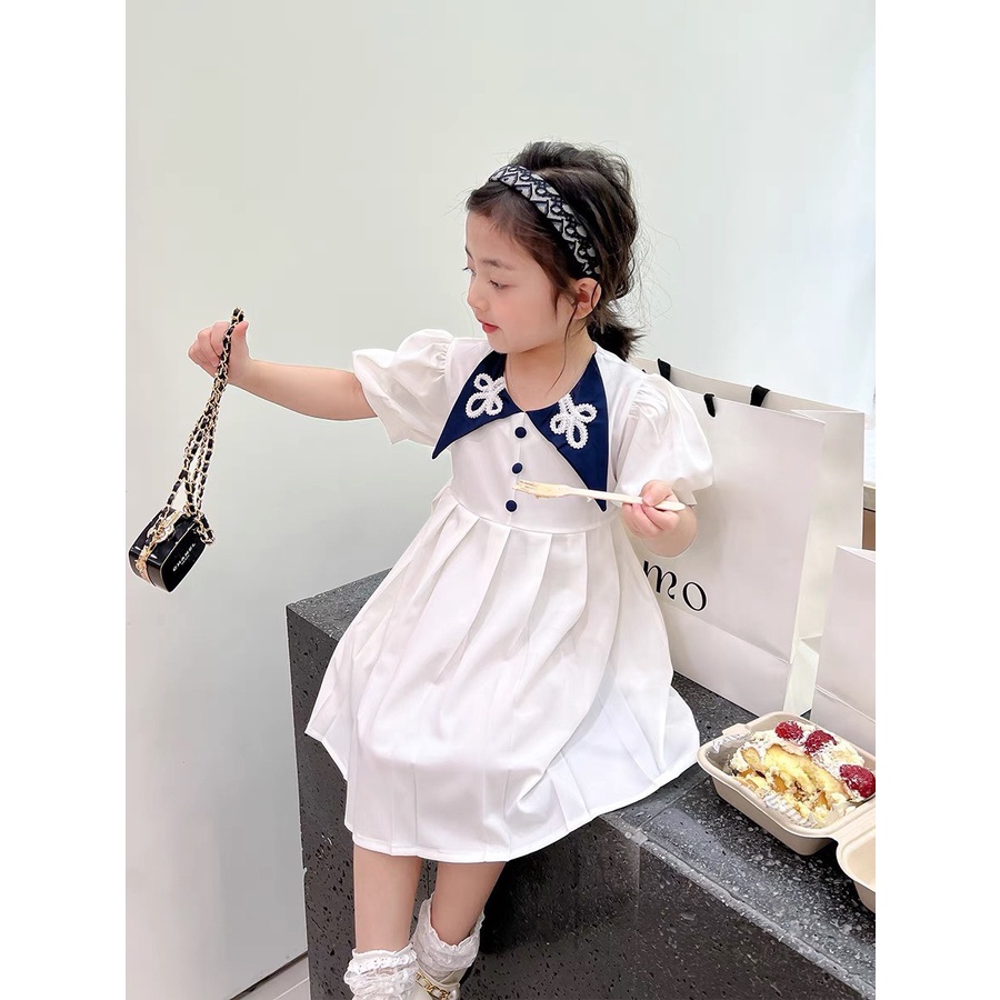 Váy Vạt Cổ Thêu  Xinh Xắn Thiết Kết Dập Ly  - Cúc Bọc Cổ Phong Cách Sang Chảnh Cho Bé Gái