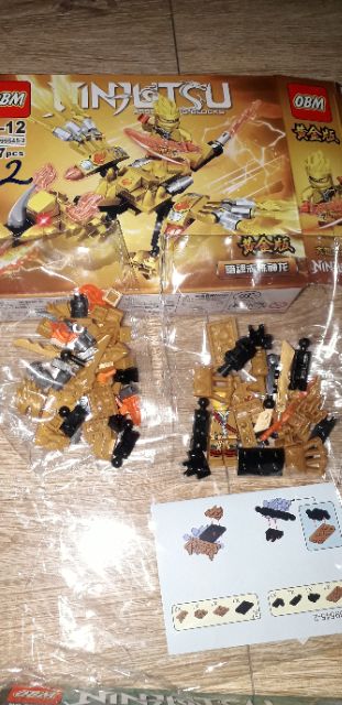 Lắp ráp 1 hộp LegoNinjutsu Rồng 99545 có nhiều chi tiết