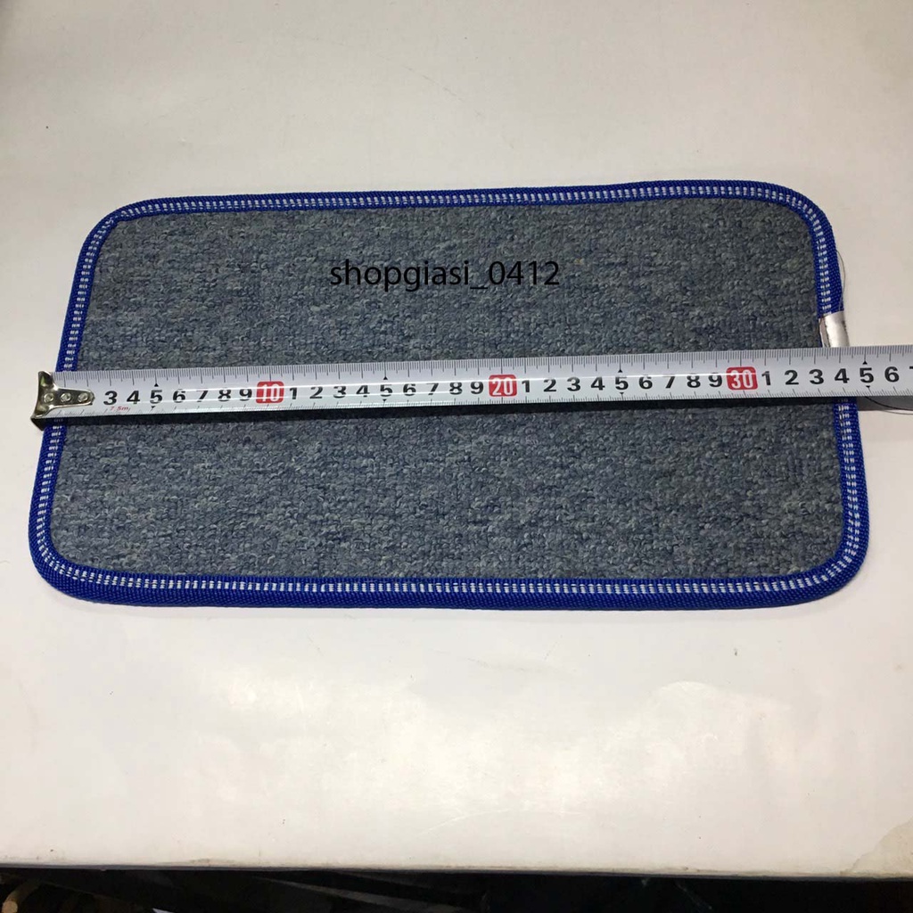 Thảm chống xe máy