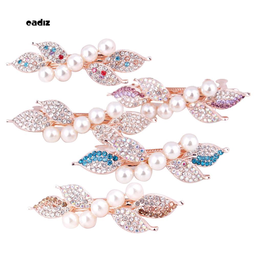 Kẹp tóc nơ đính hạt giả ngọc trai