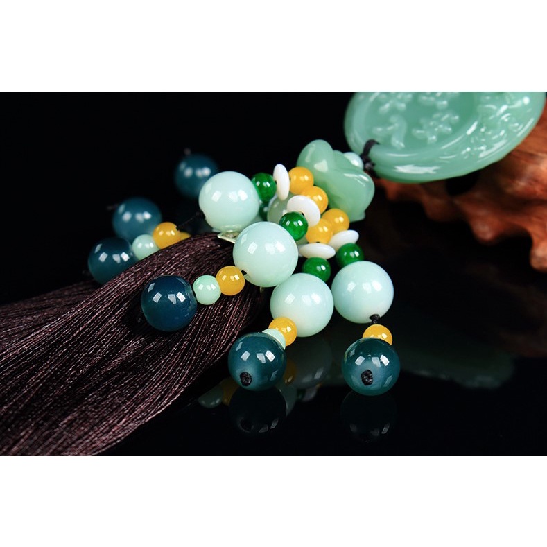 Khánh treo xe hơi xanh ngọc tua rua