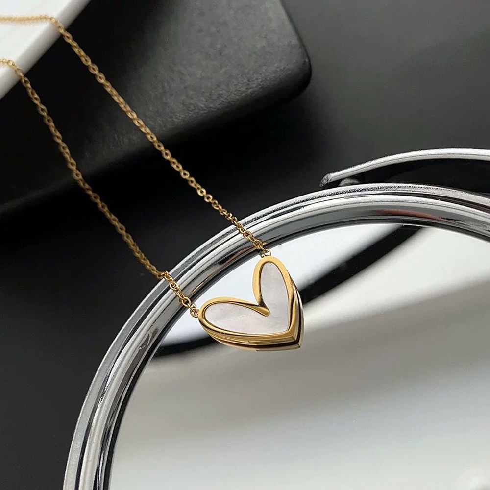 Dây chuyền bằng thép titan dính xà cừ thiết kế đơn giản sang trọng