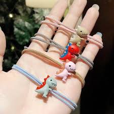 Combo 3 dây buộc tóc hoa cúc, khủng long