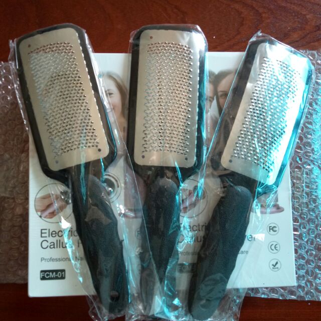 Bàn chà gót chân cầm tay