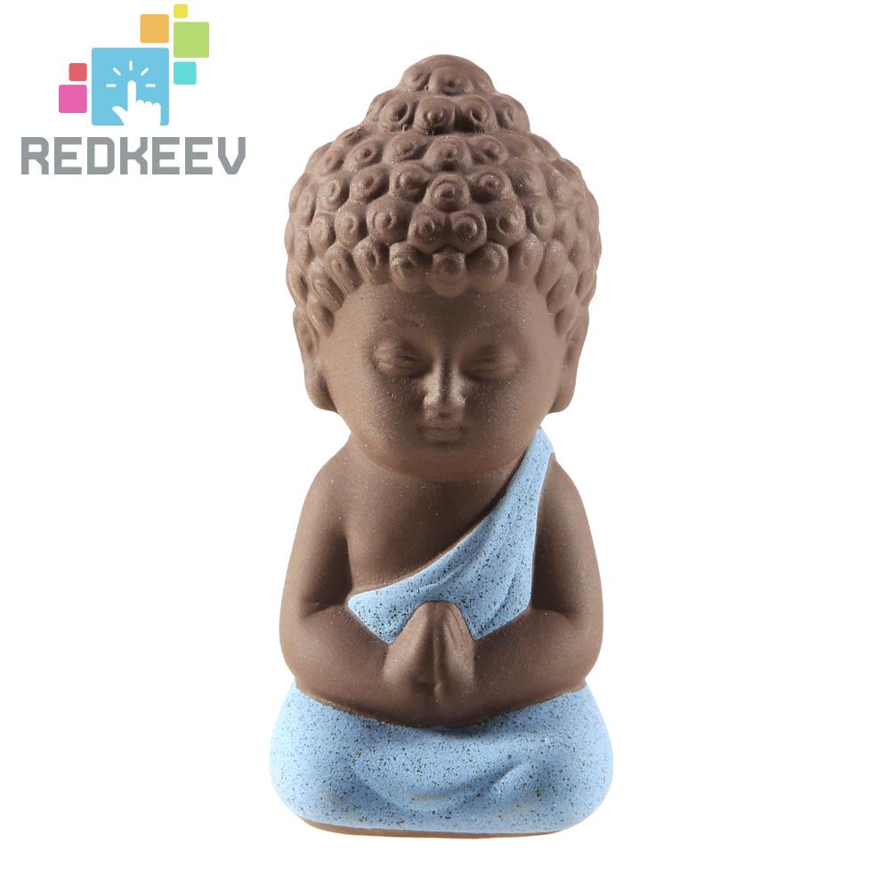 Tượng chú tiểu bằng gốm trang trí bàn trà đẹp mắt