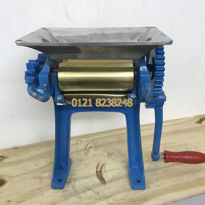 Máy cán khô mực ống đồng