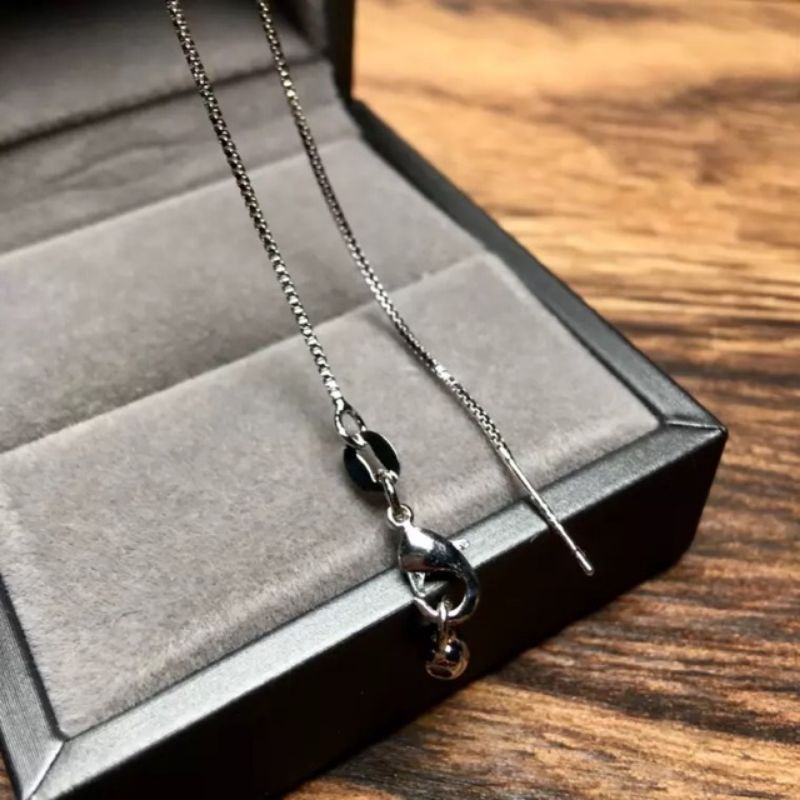 Dây chuyền bạc xỏ xuyên tâm