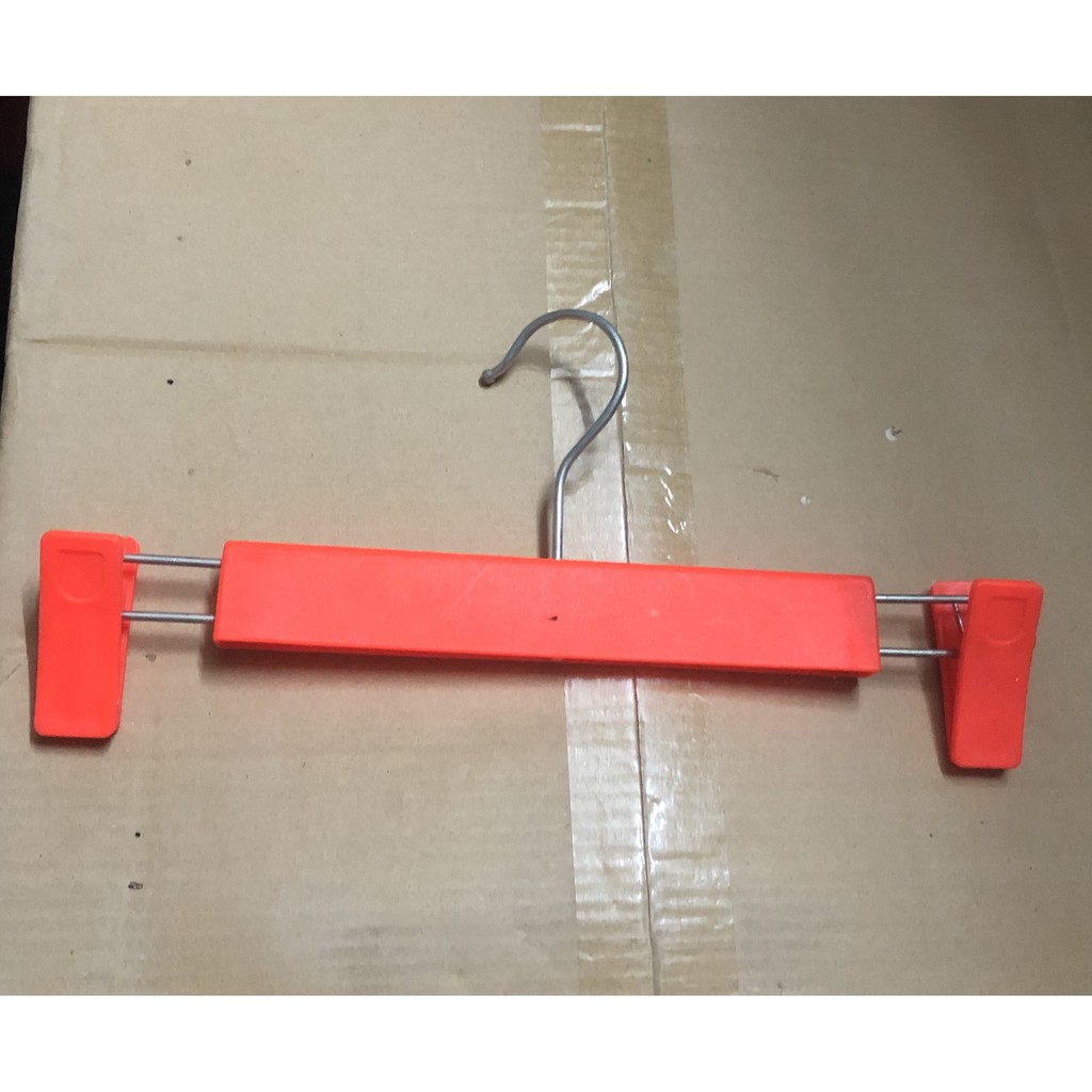 móc kẹp nhựacao cấp mầu cam treo quần chân váy người lớn 30cm 50=180k.